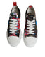 Stilvolle Dolce & Gabbana Multicolor Patchwork Low Top Sneakers mit buntem Blumenmuster, weißen Schnürsenkeln und rotem Fersendetail. Bequeme Plateausohle für modischen Alltags-Look. Hochwertige Verarbeitung typisch für Dolce & Gabbana Schuhe.