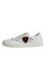 Weiße Dolce & Gabbana Portofino Sneaker mit dekorativem Herz-Emblem und Nieten. Eleganter Schnürverschluss und Gummisohle. Dolce & Gabbana White Portofino Sacred Heart Sneakers Shoes. Dolce & Gabbana, DAMEN,EXKLUSIVE MARKEN,DOLCE & GABBANA,Welcome 10,SNEAKER